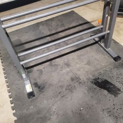 Dumbell Rack holds up to 450lbs
Base  is 19" Deep x 34.5" Wide. Below Retail Price 