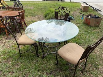 Glass top table and 3 chairs