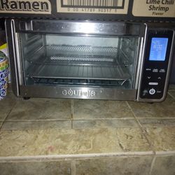 
Gourmia Digital 4-Slice Toaster Oven Air Fryer 