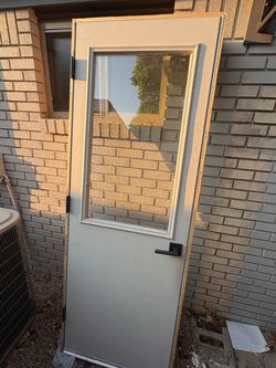 2’0”x 6’8” steel insulated door w/ half light insert