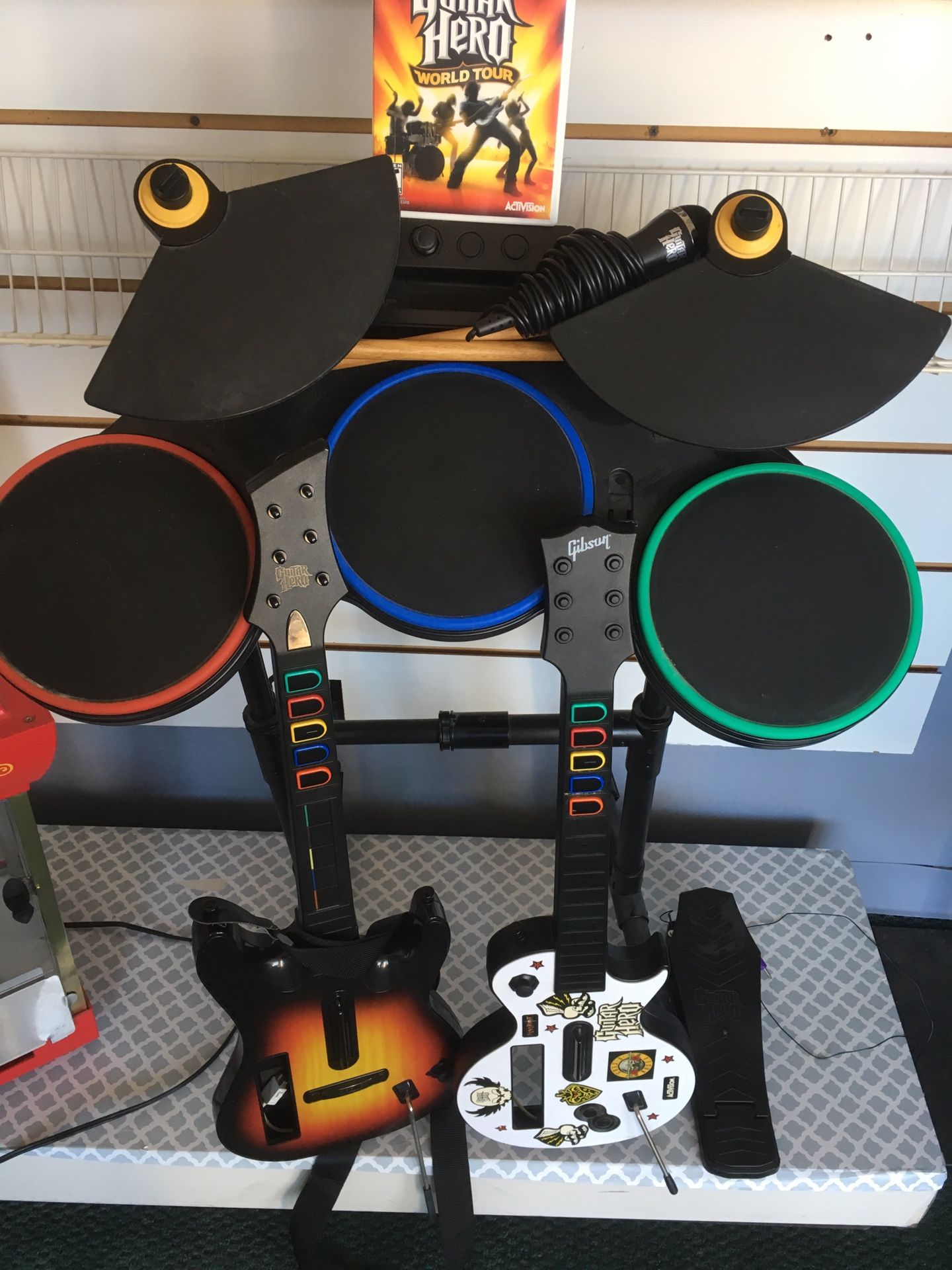 Guitar hero game with 2 guitars, drum set and mic