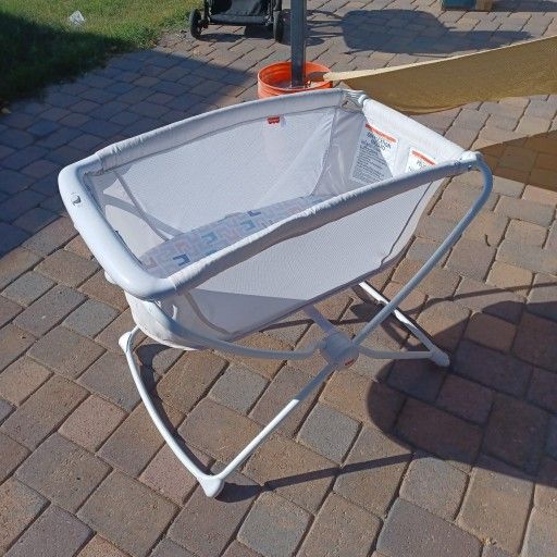 Fisher-Price Rock with Me Bassinet Color Scoops, Travel Baby Crib with Rocking Motion
