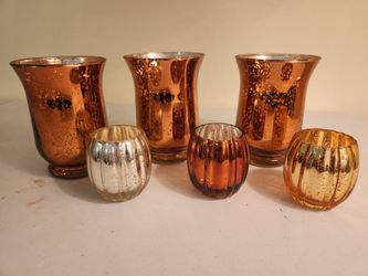 Orange and silver "mercury" style candle holders