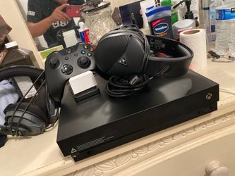 Xbox one x (I could deliver Miami area )
