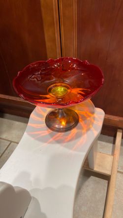 Mid-century red amber glass with sterling silver bottom candy dish.
