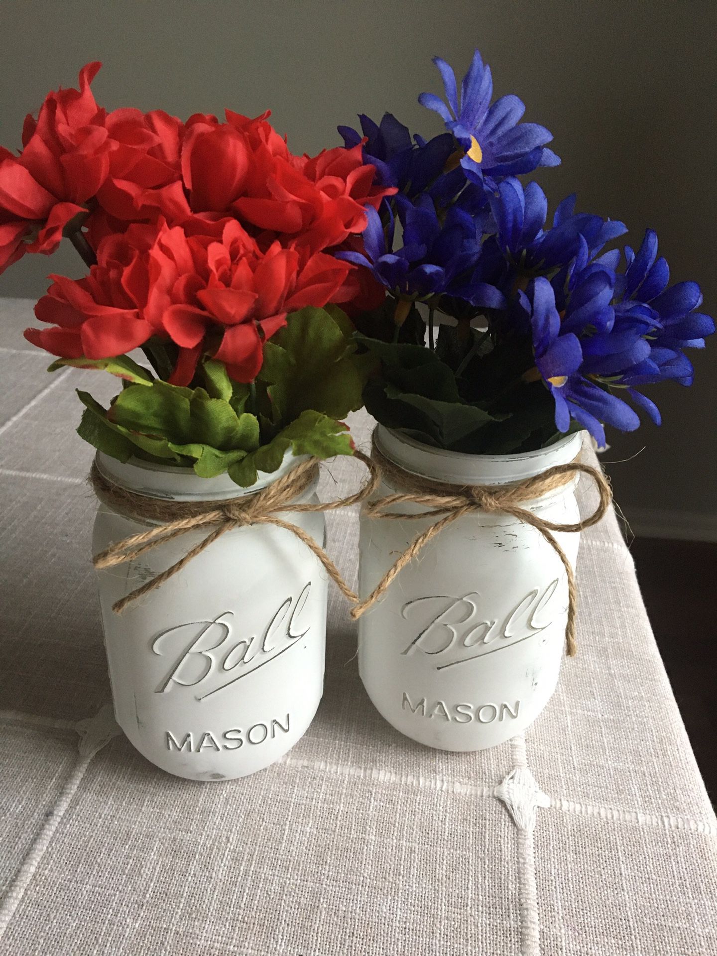 Distressed mason jar vases with silk flowers $10 for both