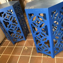 Two matching blue end tables 