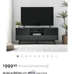 Larsen Smart Tv Stand With Bluetooth Speakers USB And Wireless Charging