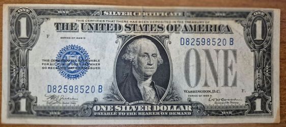 1928-D $1 Silver Certificate - Funnyback - Julian-Woodin Note (F w/ tear)