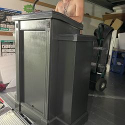 a metal podium or lectern for speaking