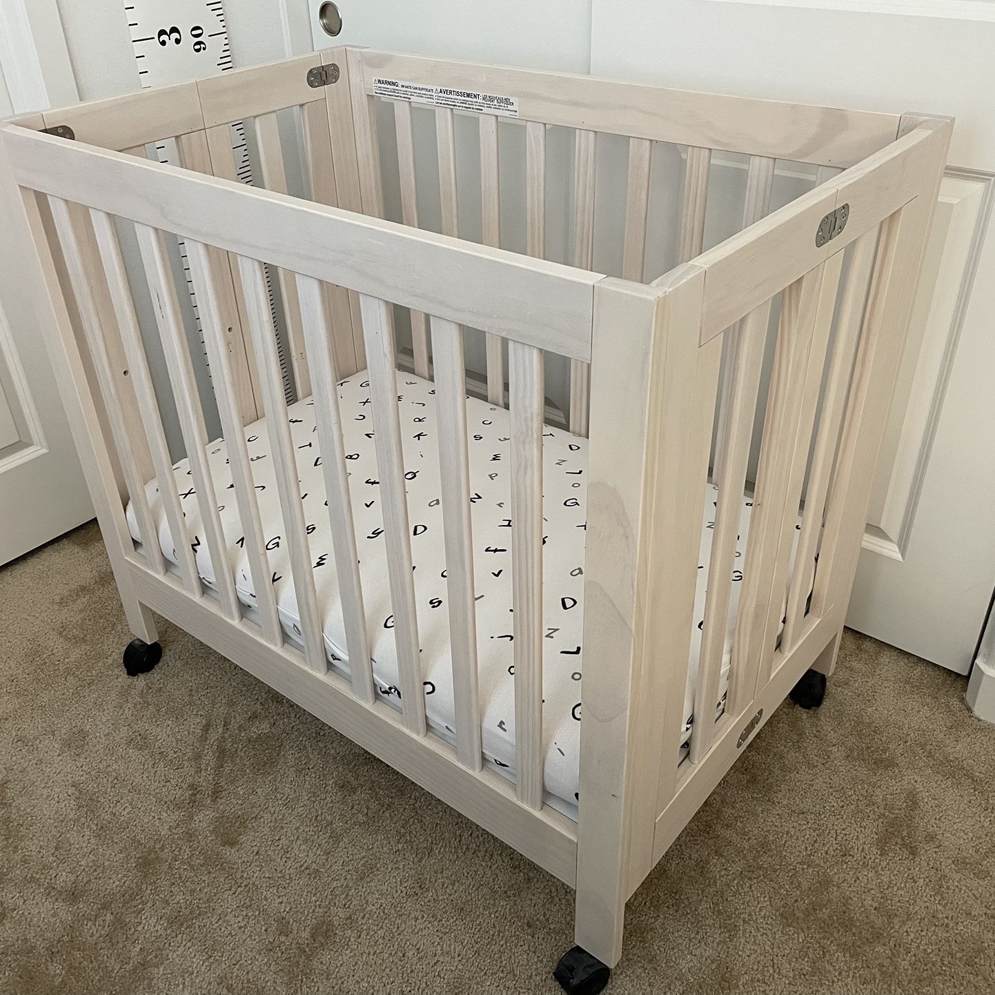 Babyletto origami mini crib 2024 used