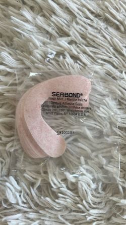 Seasons lower adhesive dentures