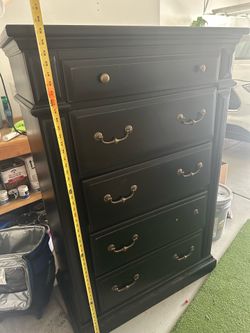 Black, distressed, tall dresser
