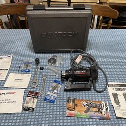 Rotozip spiral saw with accessories