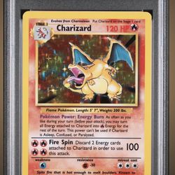 PSA 7 NM: Charizard Holo 1999