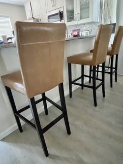 3 Brown Leather Stools