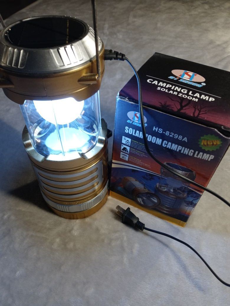 Solar zoom camping lamp AC rechargeable solar charge. LED lamp