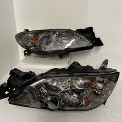 04 2009 Mazda 3  Headlights