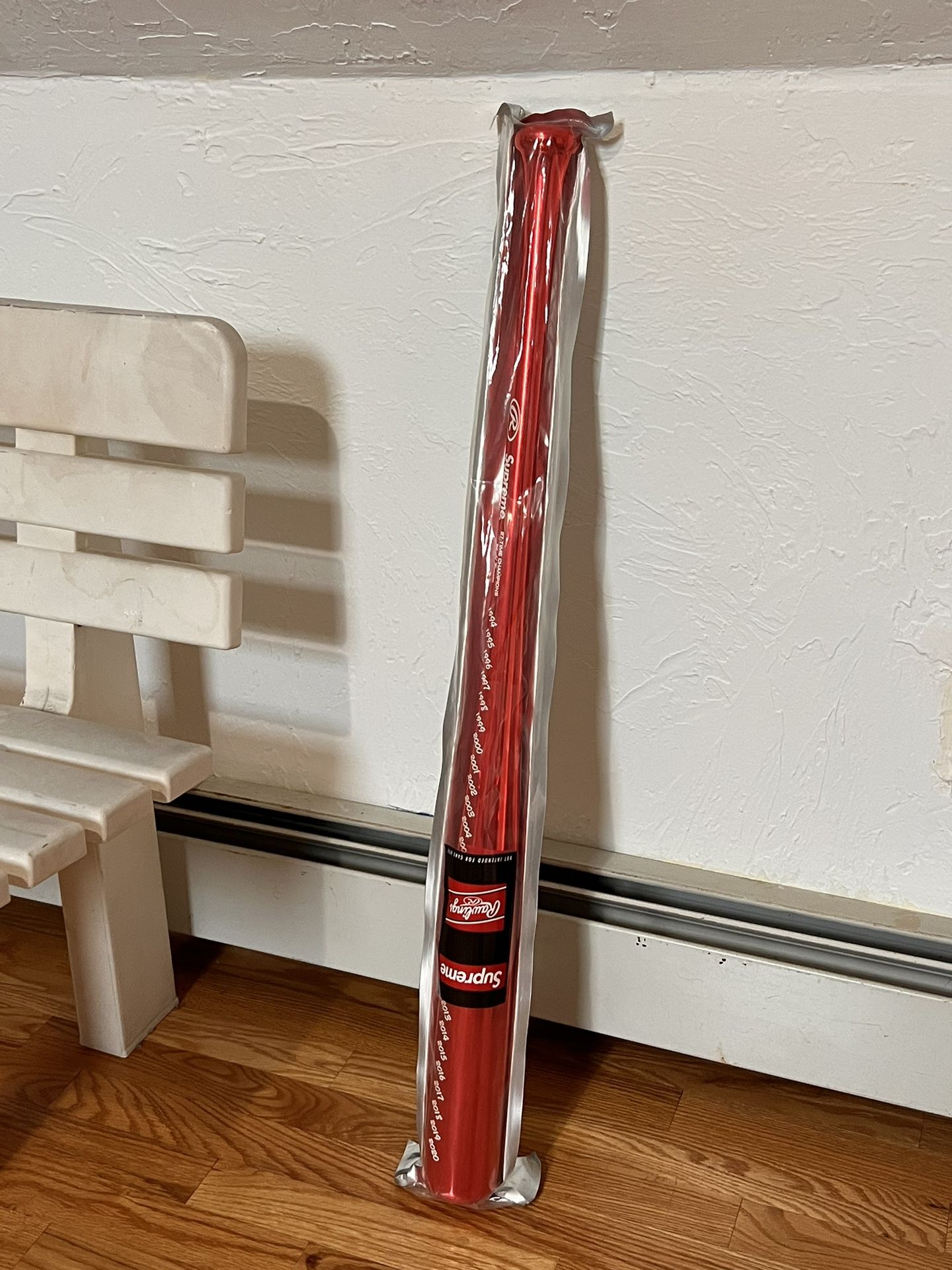 Supreme red chrome maple wood baseball bat