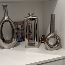 Silver/ chrome vases 