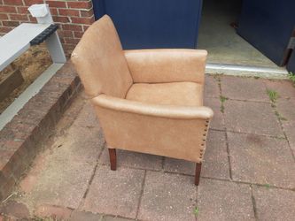 Leather upholstered armchair