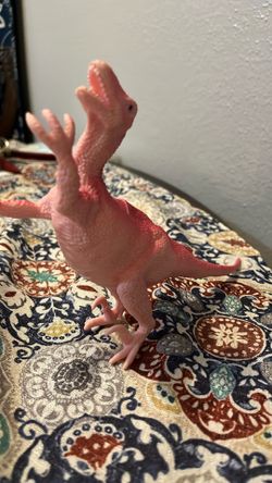 Pink Velociraptor plastic dinosaur