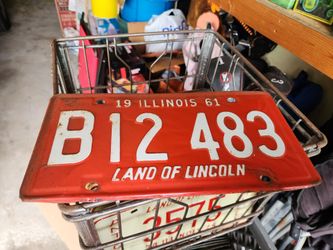 Two 1961 matching license plates