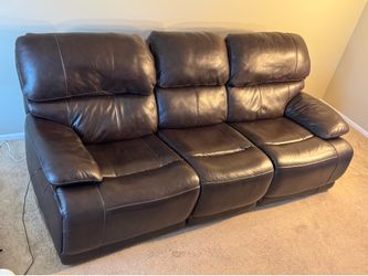 Brown leather dual recliner couch with USB