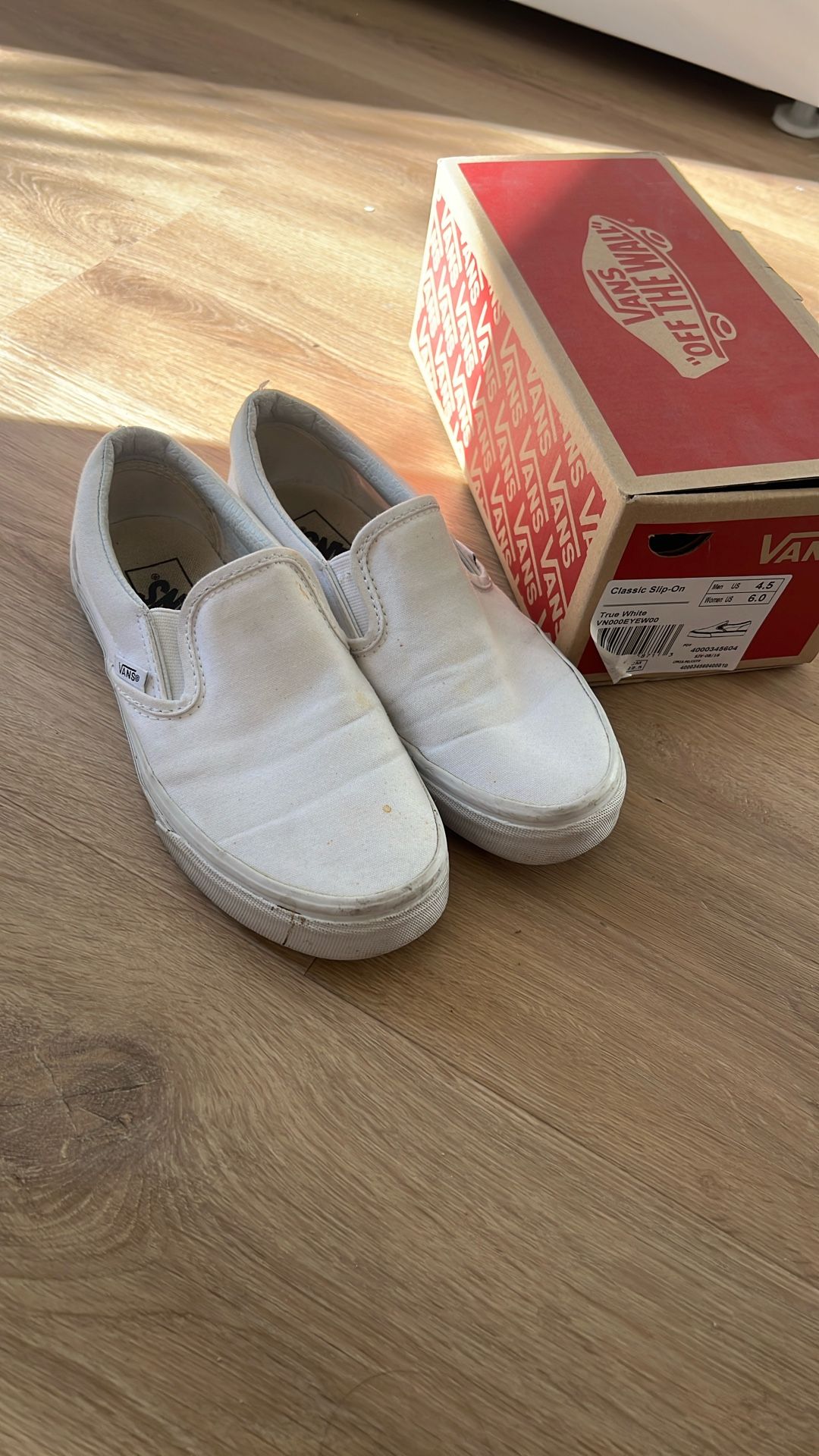 Vans White Slip Ons
