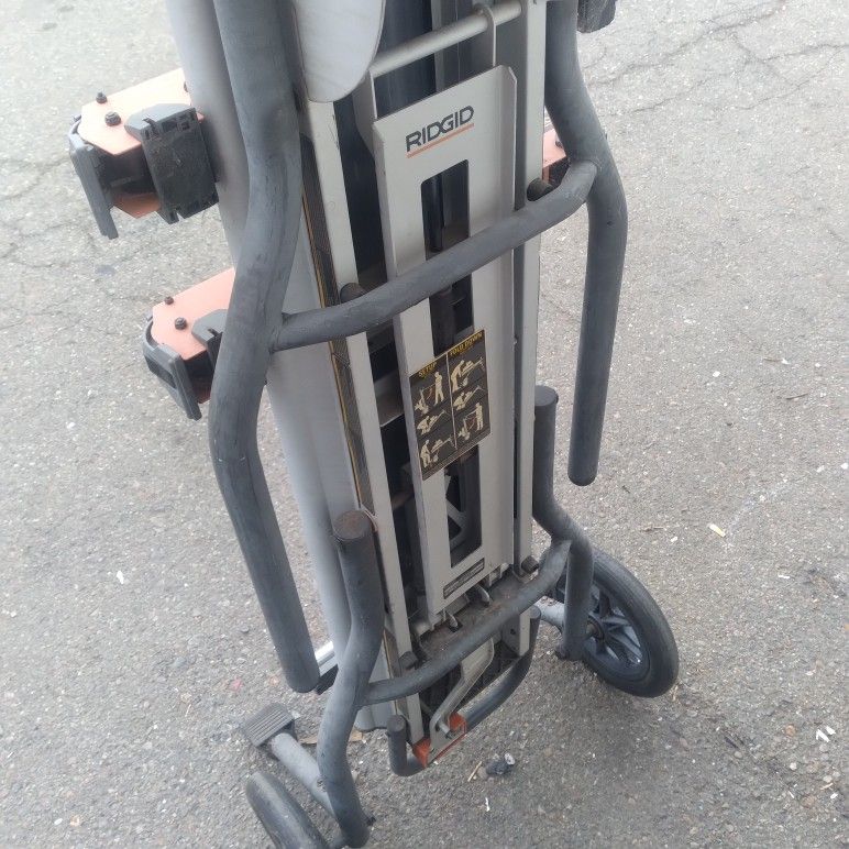 Ridgid classic heavy duty miter saw cart stand 2 wheels. Missing parts