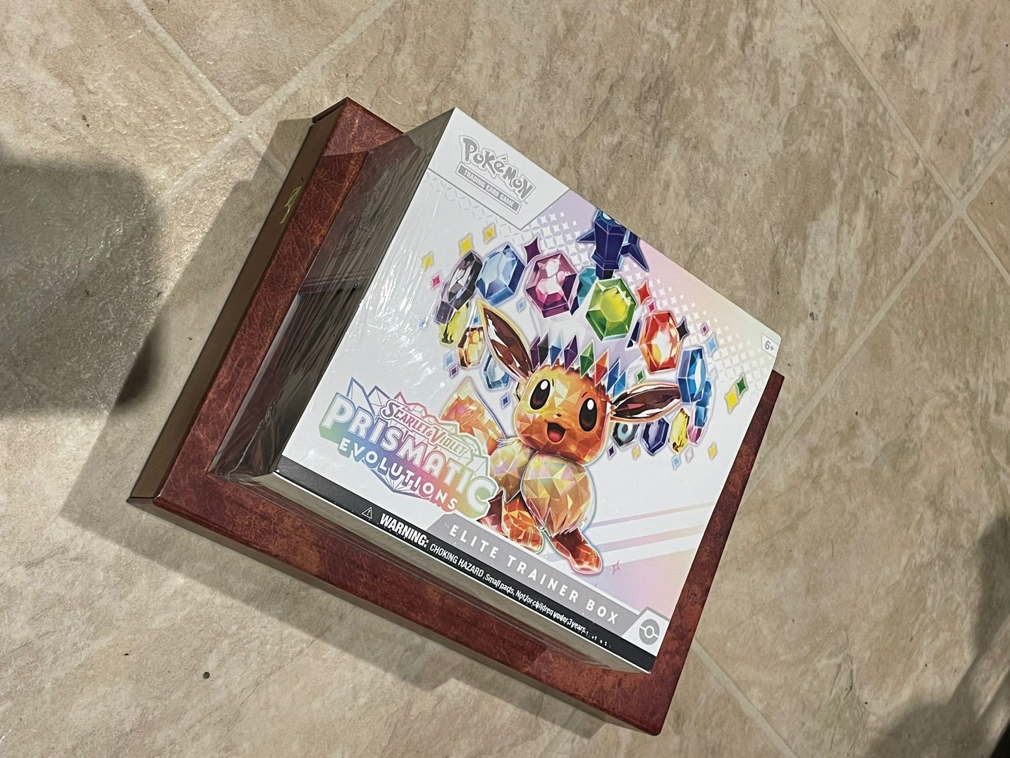 Pokémon Prismatic Evolutions Elite Sealed Box Booster Packs