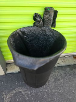 Black Plastic Trash Can with Liner