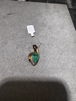 14k natural emerald charm with diamonds