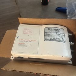 Used chronomite instant flow micro water heater