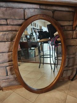 Oval wall mirror 44x27