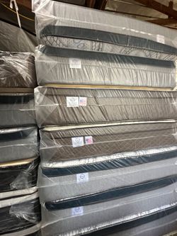 Queen Size Mattress Pillow Top 12"   new mattress in a plastic sealed. We offer same day delivery