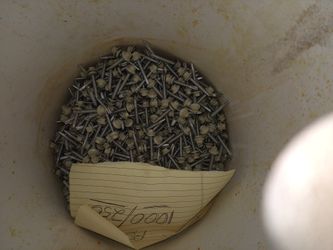 Tin Roof Screws With Rubbers On Them Beige There's A Long Ones There's A 1,250 Of Them