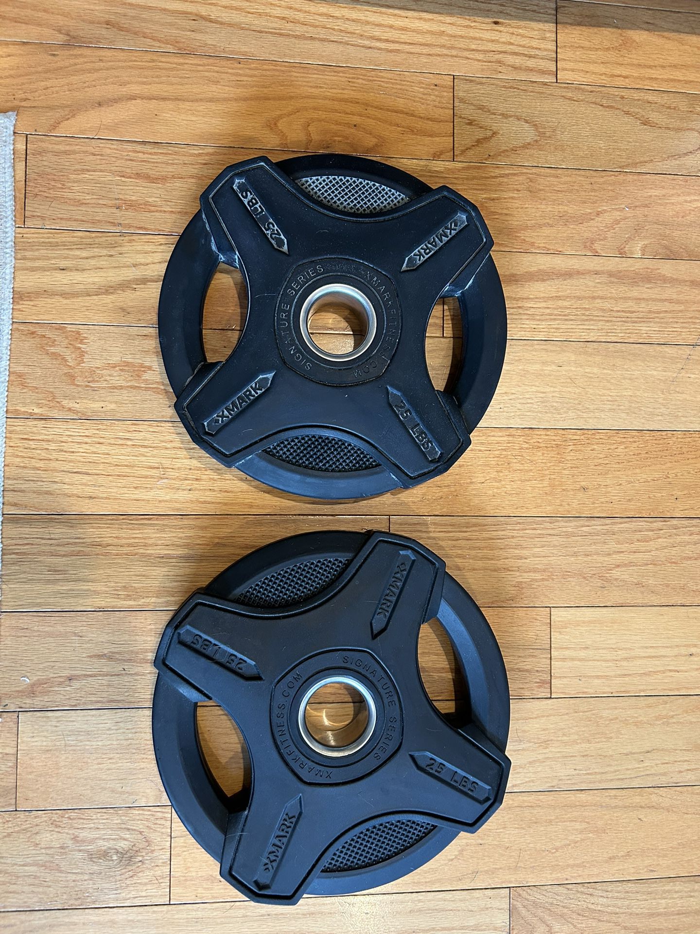 Pair Of 25lb X-Mark Signature Olympic Weight Plates