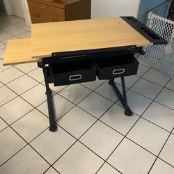 Drafting Table, Tilts & Is height adjustable (lightly Used)