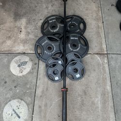 Olympic weights 220lbs total plus 7ft 45lbs bar ethos