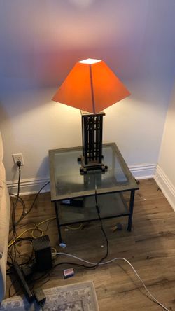 Galas and black metal corner table