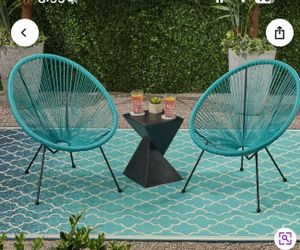 2 New chairs and outdoor rug