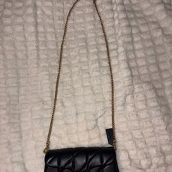 Black Coach quilted strap