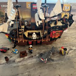 LEGO Creator 3in1 Pirate Ship Building Set, Rebuild The Pirate Ship into an Inn or Skull Island, Features 4 Minifigures and Shark (1,260 Pieces); #311
