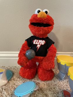 Elmo Toy Set. Elmo Sings, Talks And Plays The Instruments