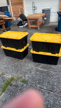 Four black storage boxes for $25
