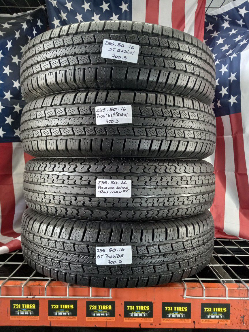 4 USED TIRES ST235/80R16 TRAILER TIRES