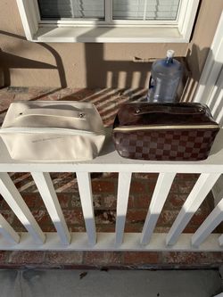 2 small cosmetic bags