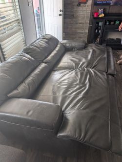 Leather Reclining Sofa