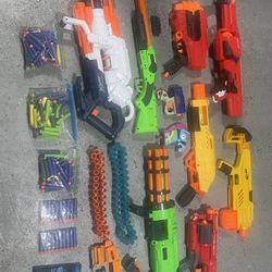 Assorted Nerf Guns And Darts
